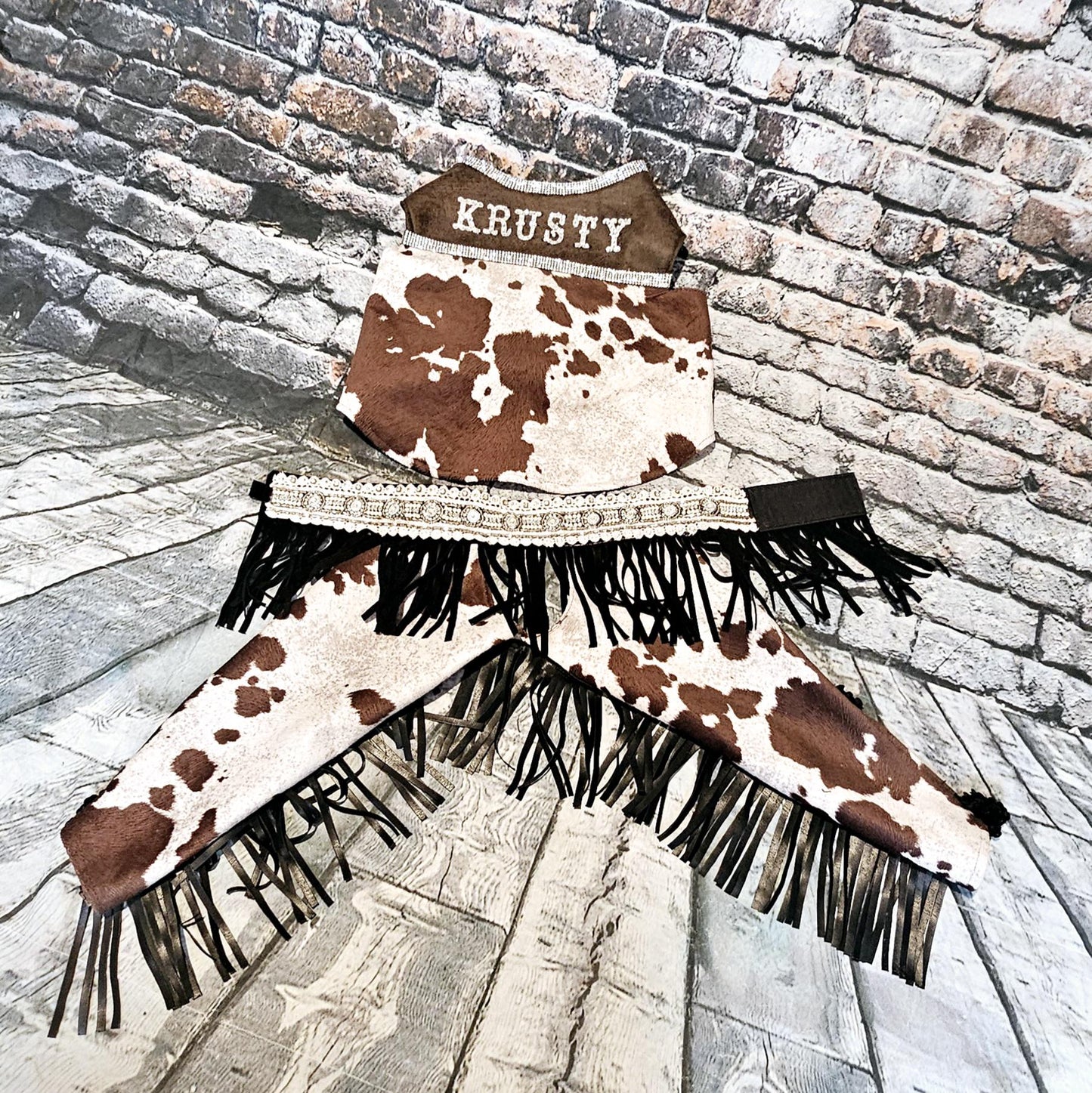 - A Western pet costume, chaps for pets, vest and chaps pet costume