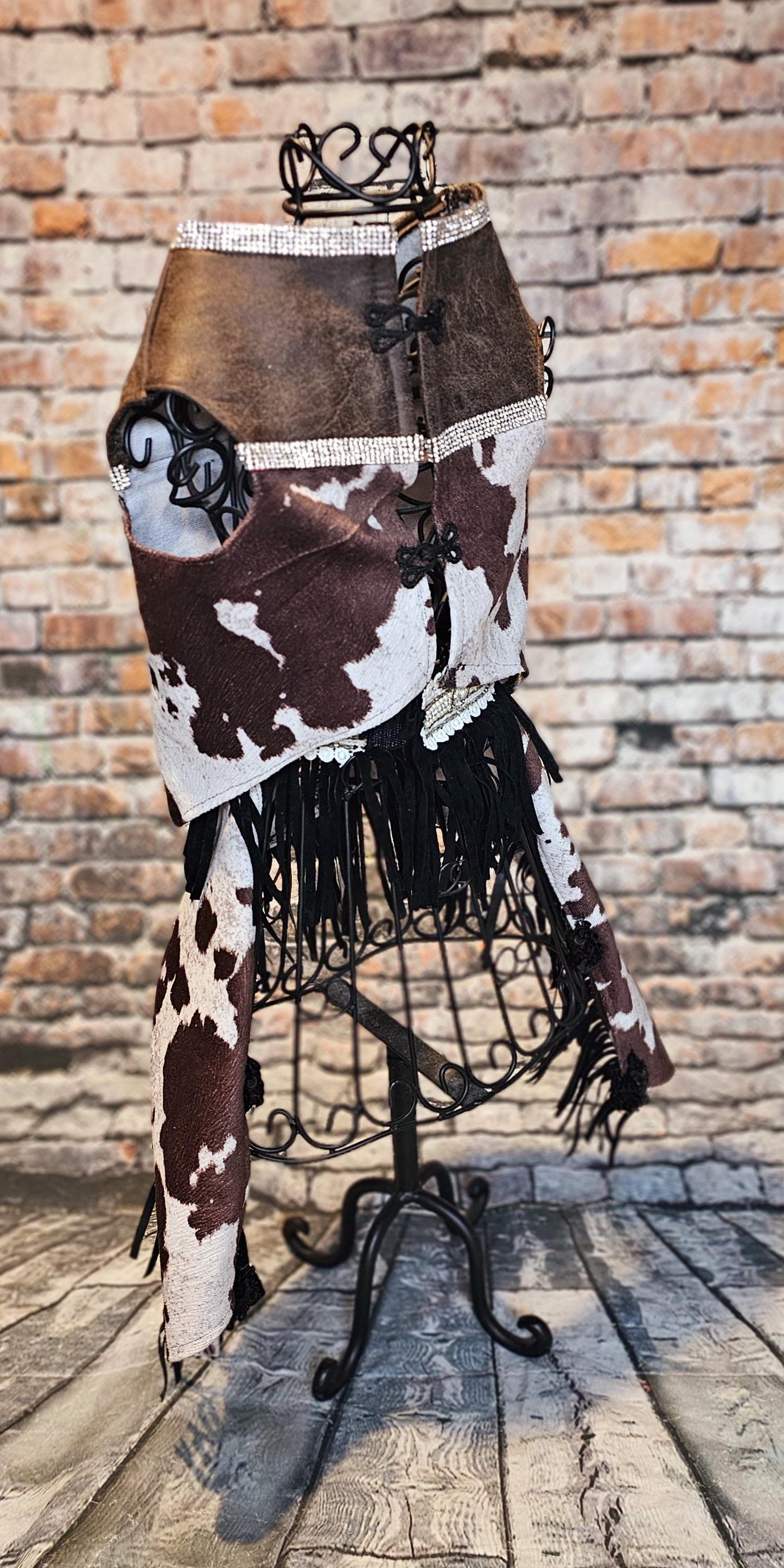 - A Western pet costume, chaps for pets, vest and chaps pet costume