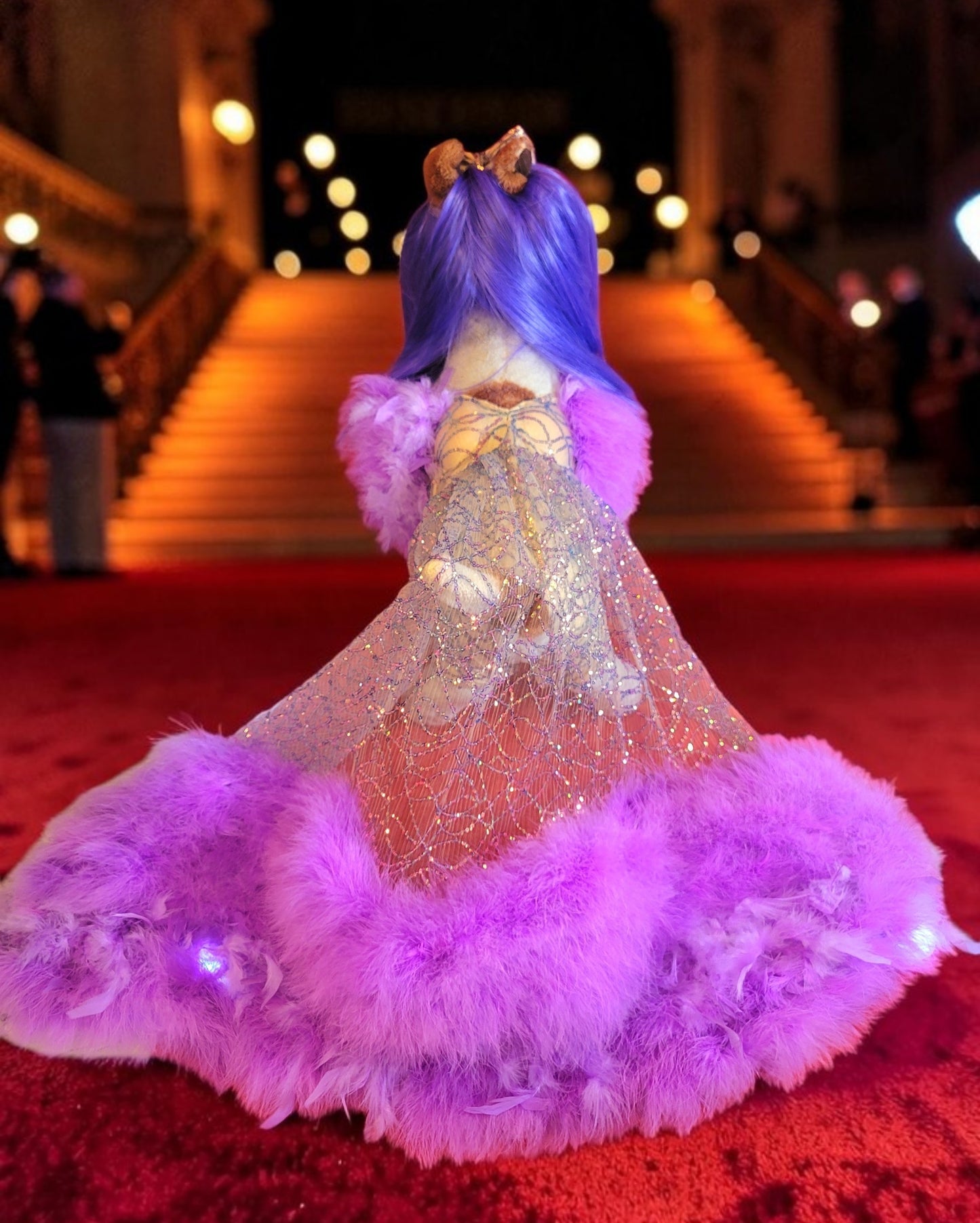 Kylie Jenner Met Gala pet costume, Kylie Jenner purple feather pet costume, met gala pet costume