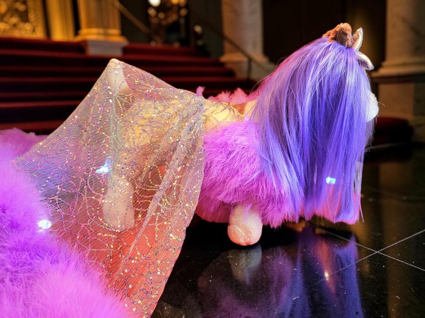 Kylie Jenner Met Gala pet costume, Kylie Jenner purple feather pet costume, met gala pet costume