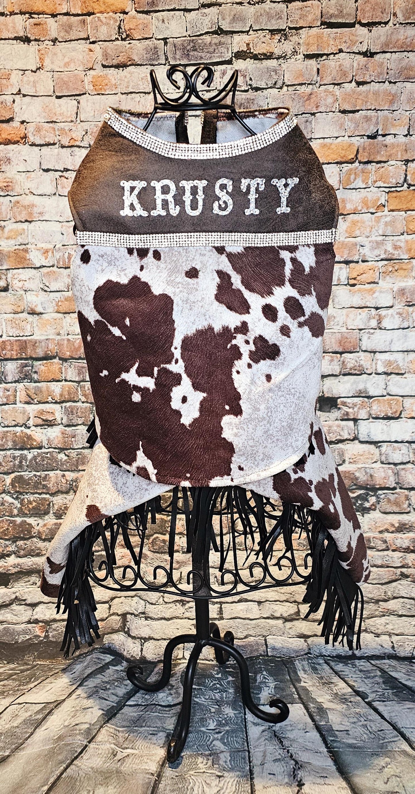 - A Western pet costume, chaps for pets, vest and chaps pet costume